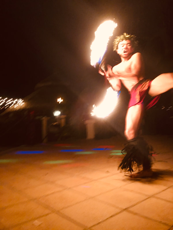 Polynesian Fire show Samon Fire knife dancer